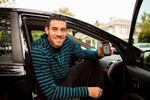 1 Uber customer with his ride summoning app
